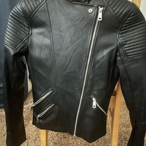 H&M faux leather jacket with some wear on the back of the neck. Size 2